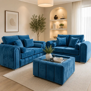 Blue sofa set in a living room with decor elements.