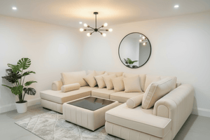 Lilly U Shape Sofa in modern velvet with white trims and deep cushions, paired with a glass coffee table by The Sofas Studio.