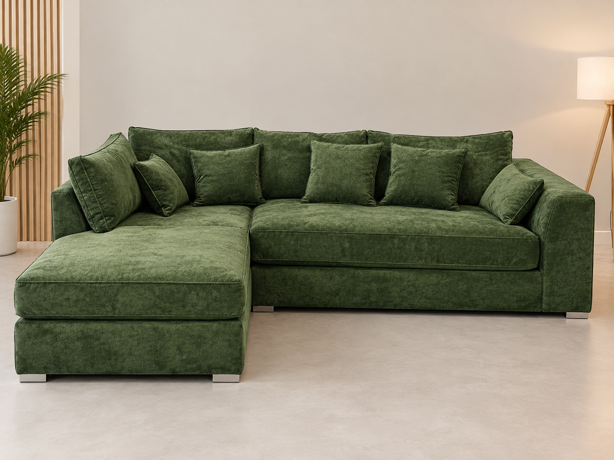 Green fabric L shaped corner sofa with scatter cushions and silver feet
