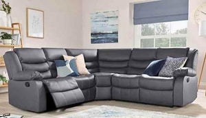 Gray sectional sofa in a living room setting with decor elements.